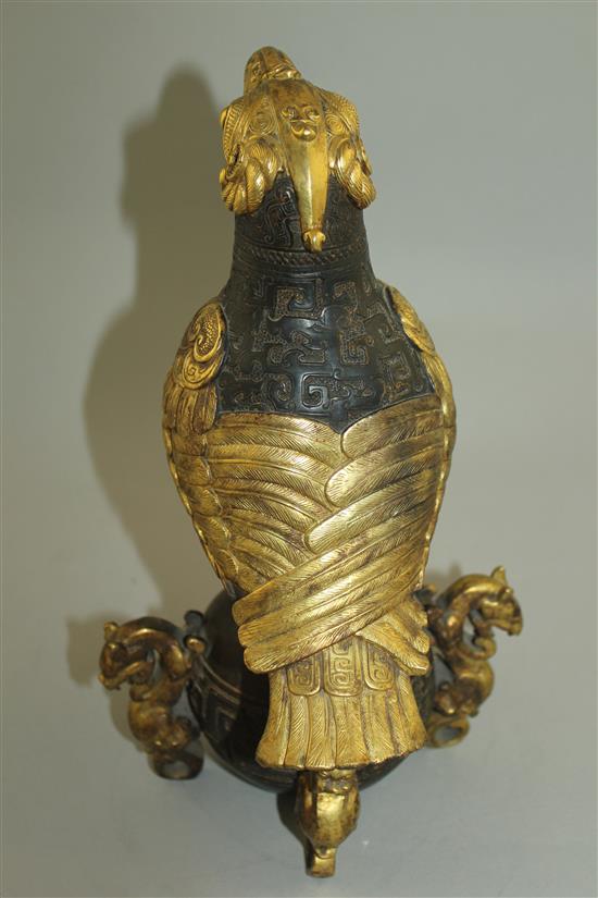 A Chinese part gilt bronze model of an eagle, in Han dynasty style, 29.5cm